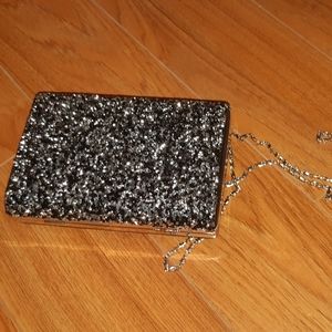 Silver and black clutch